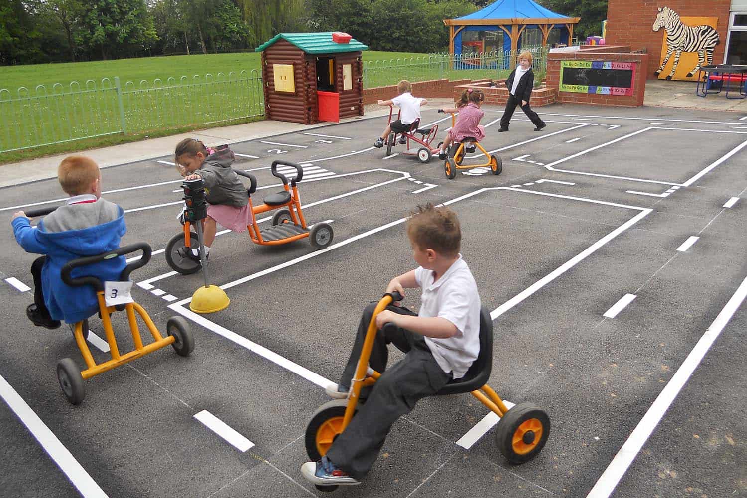 Colourful thermoplastic roadway and playground markings